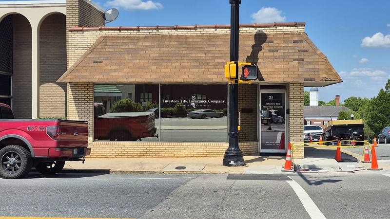 Investors Title Insurance Church Means corner downtown Concord NC