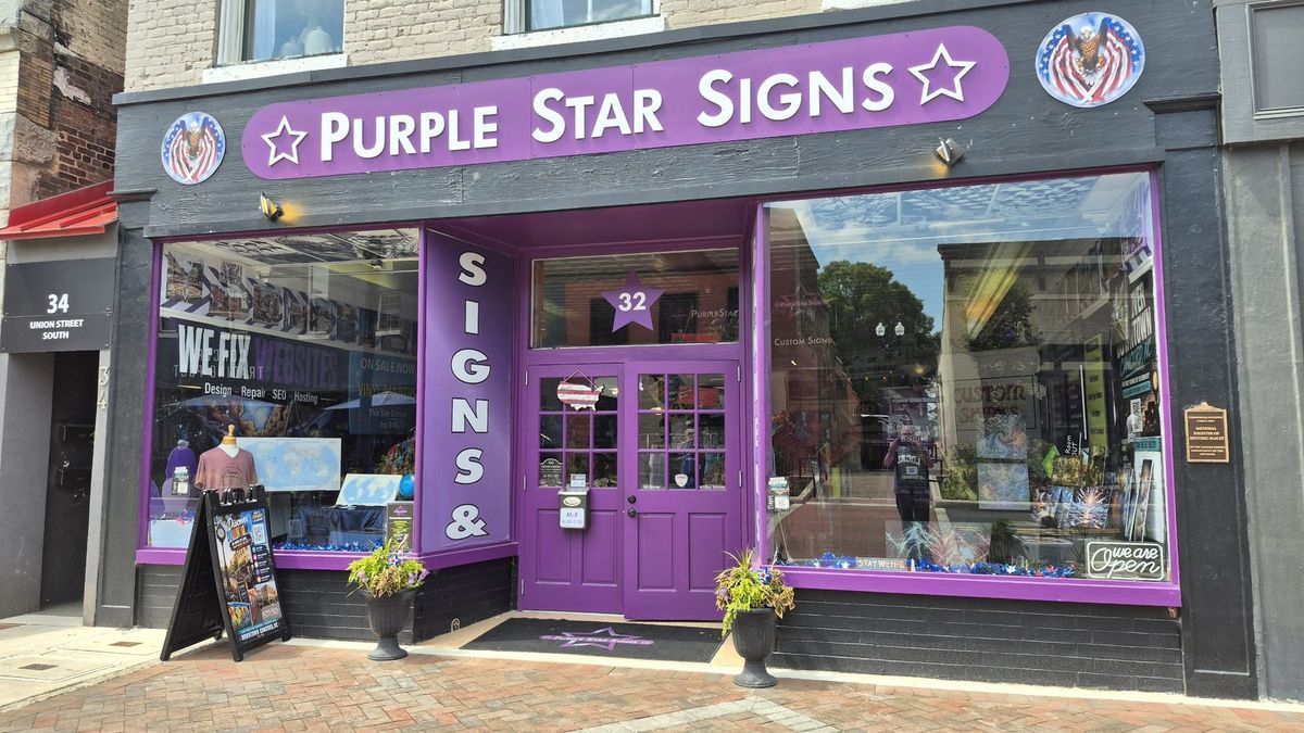 Purple Star Signs storefront 32 Union St S downtown Concord NC