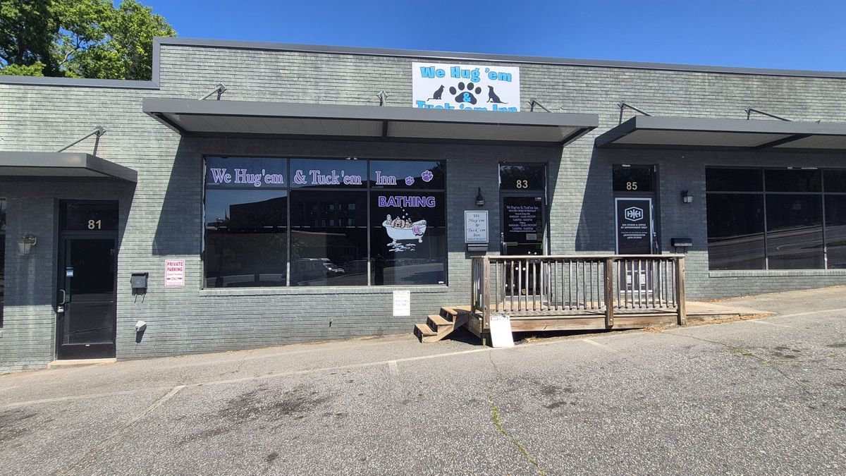We Hug'em & Tuck'em Inn storefront McCachern